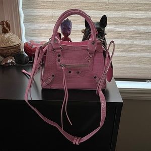 Mini pink ego bag with adjustable strap